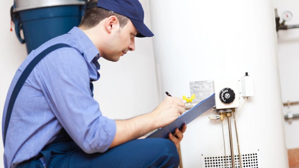 man checking boiler