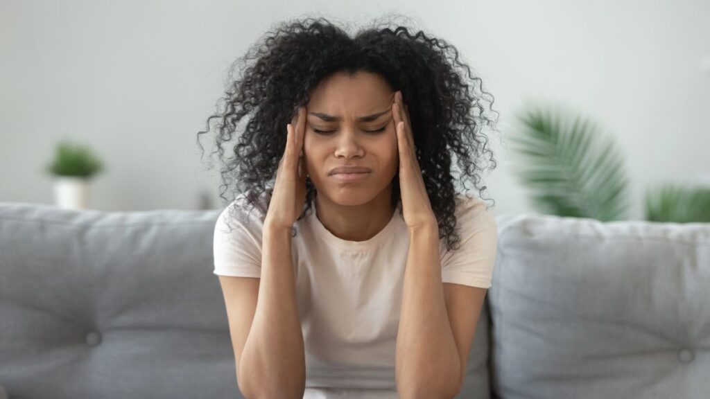 stressed woman with headache