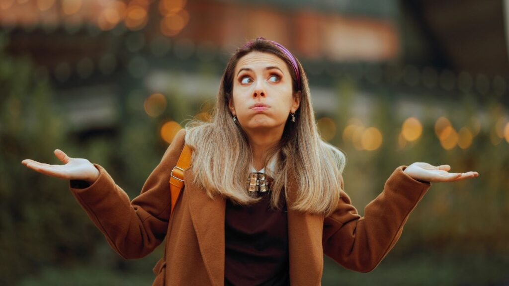 woman looking confused outside