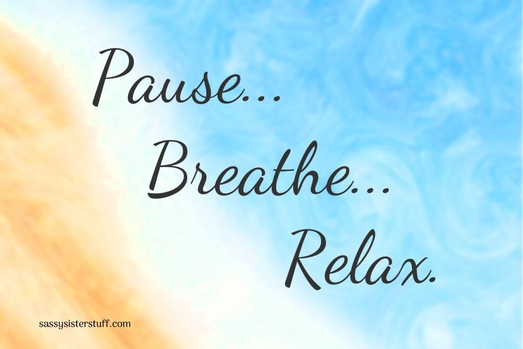 pause, breathe, relax on a swirly blue and orange background