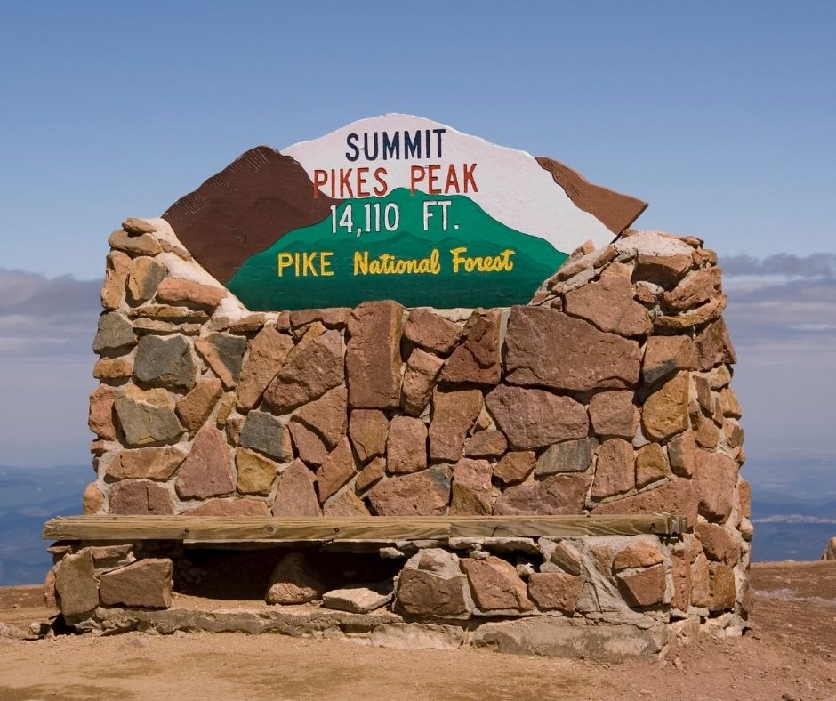 pikes peak summit sign at pike national forest