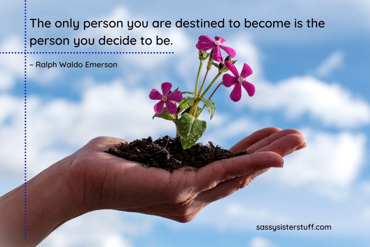 personal development quote by Ralph Waldo Emerson on an image of someone's hand holding a growing pink flower against a blue sky