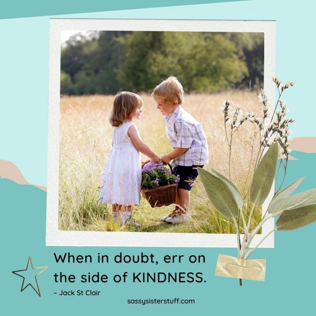 young boy giving flowers to young girl with kindness quote