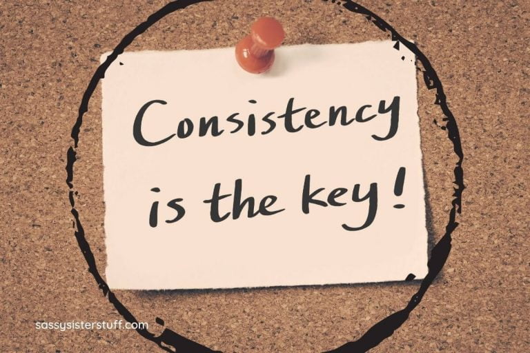 consistency is the key written on a note and thumb tacked to a cork board