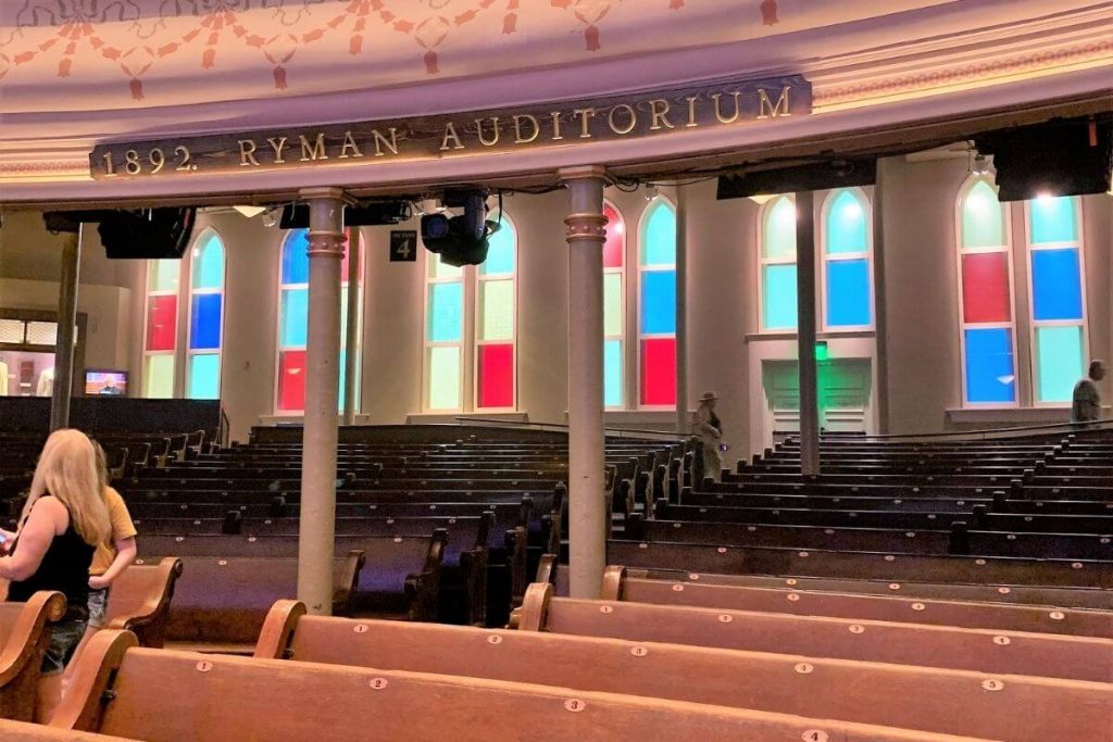 inside the Ryman auditorium in Nashville original church pews from 1892