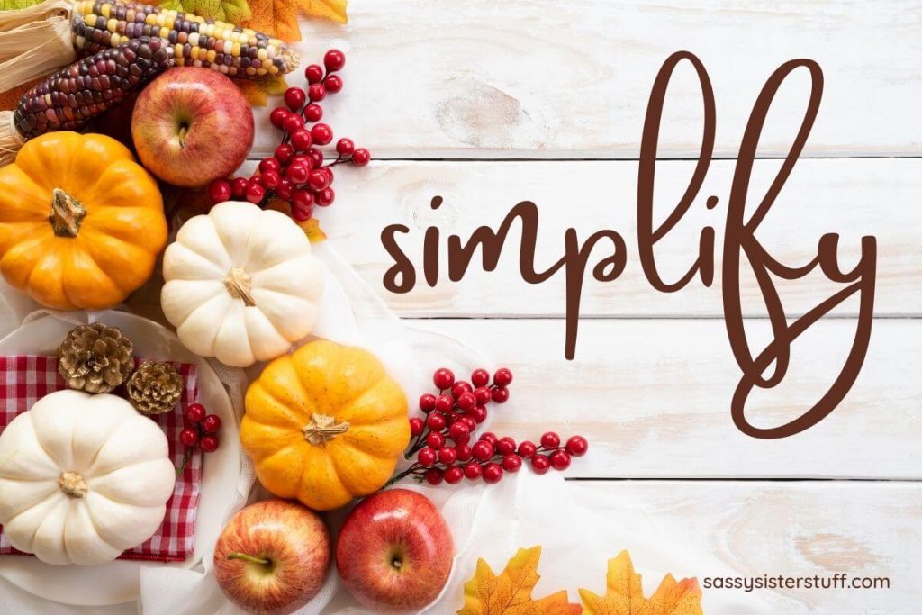 fall pumpkins apples corn and berries with a reminder to simplify as you are getting organized for the holidays