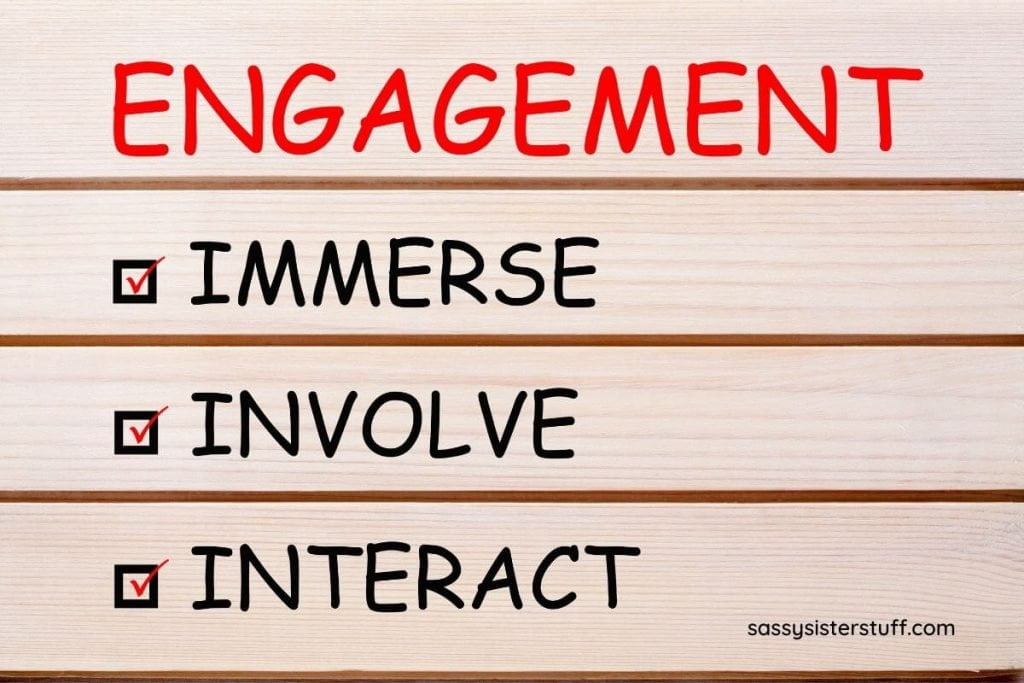 engagement = immerse involve and interact written on a board