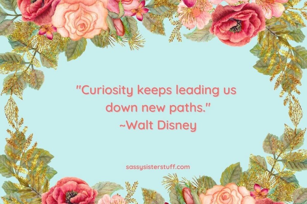 a find your path quote by Walt Disney on a mint background with pink and peach flowers