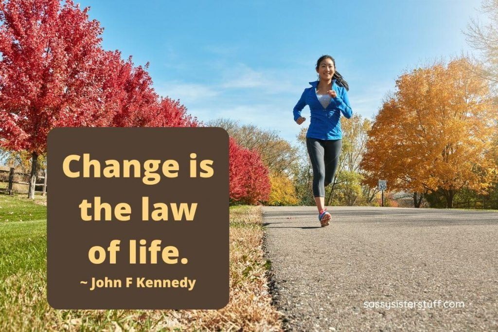 a young women runs on the side of a street with red trees on one side and yellow trees on the other side and green trees behind her plus a quote about life changes