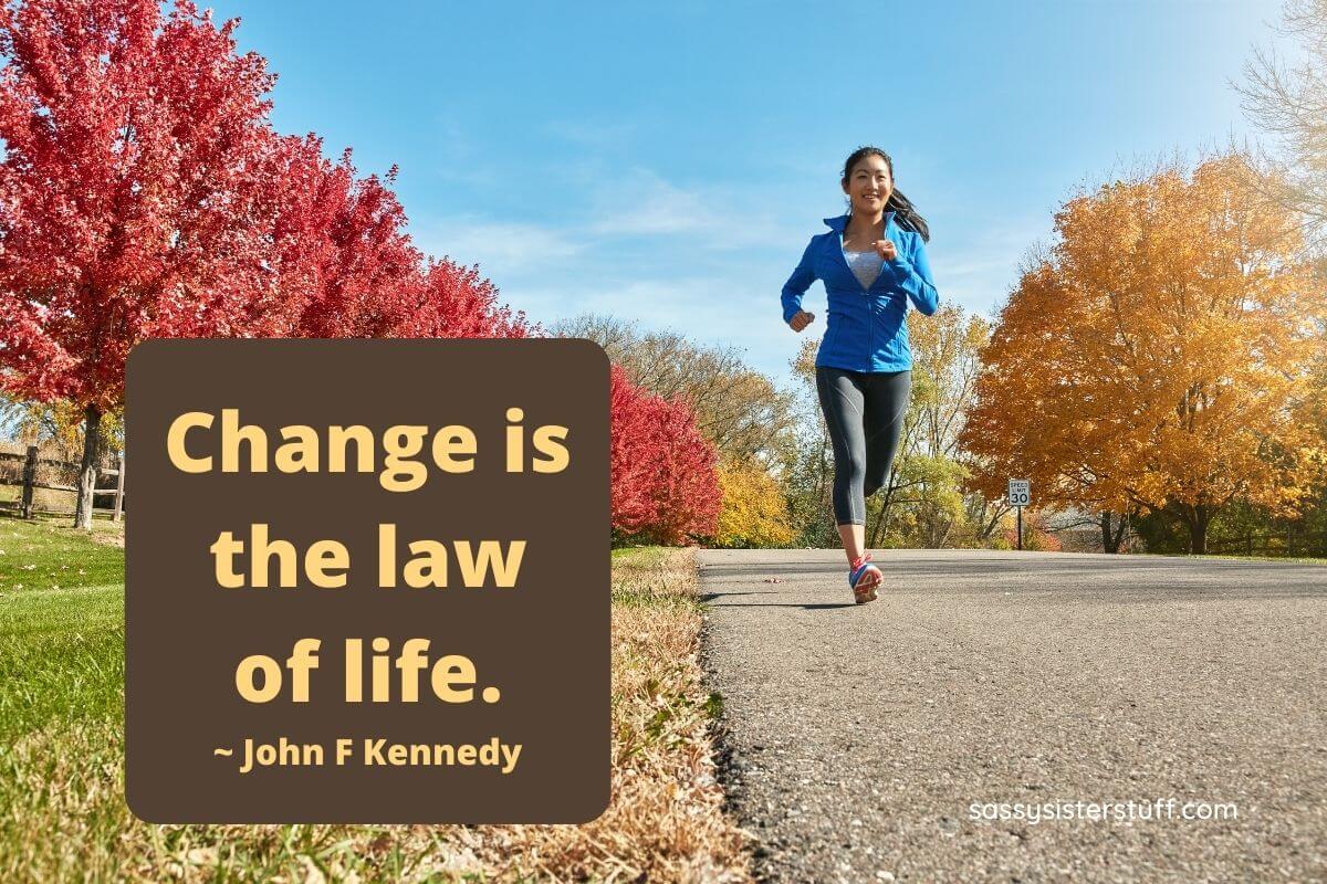 a young women runs on the side of a street with red trees on one side and yellow trees on the other side and green trees behind her plus a quote about life changes