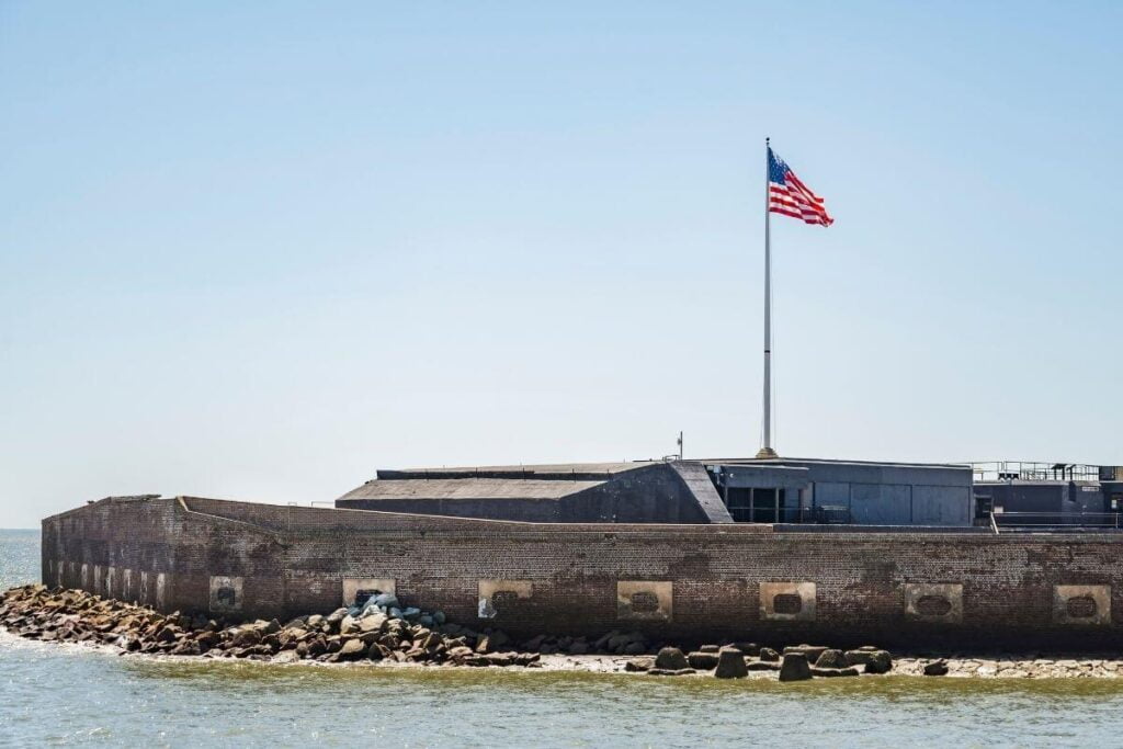 fort sumter south carolina with a flag hanging over it