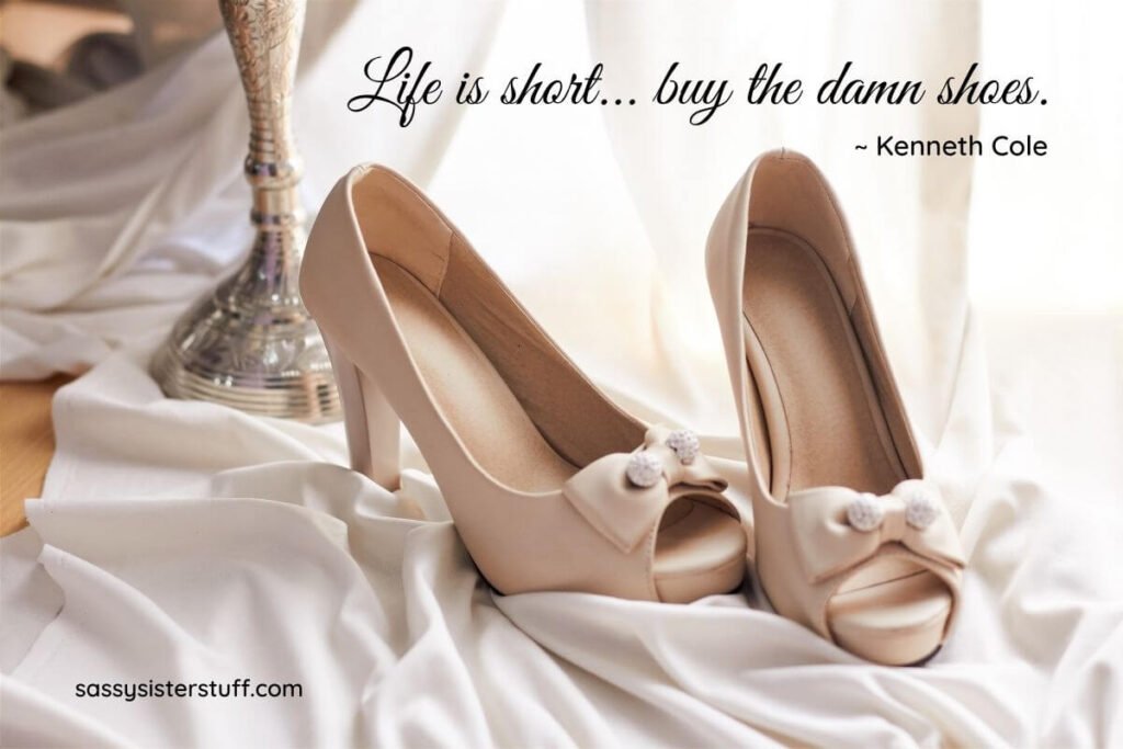 a beautiful dressy pair of fancy shoes in ivory with bows on the open toe sitting on a display of ivory fabric and silver vase with a quote about bucket list ideas