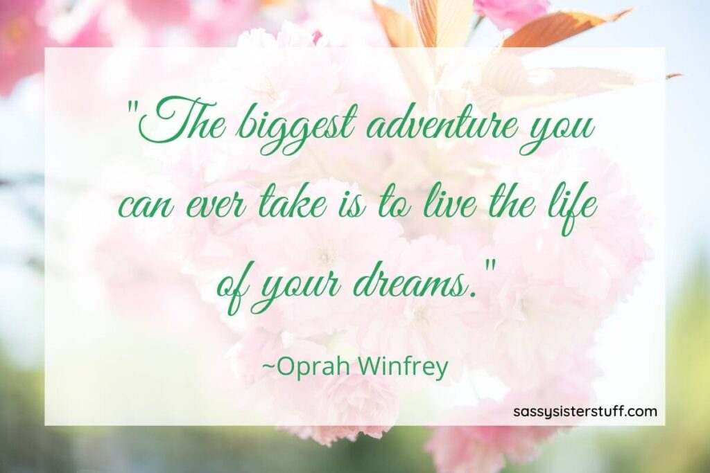 Oprah Winfrey quote written in green cursive on a floral background of greens pinks and yellows