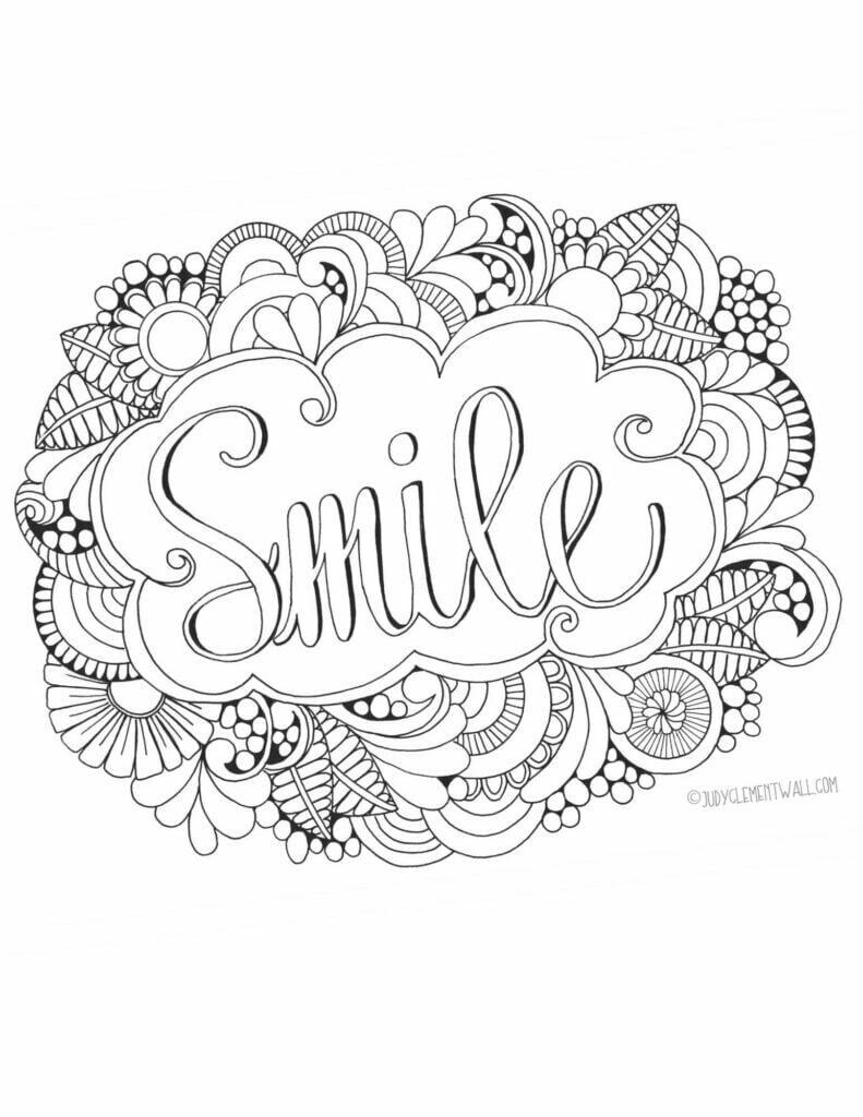 black and white drawing of an oval made with flowers and the word SMILE inside the oval