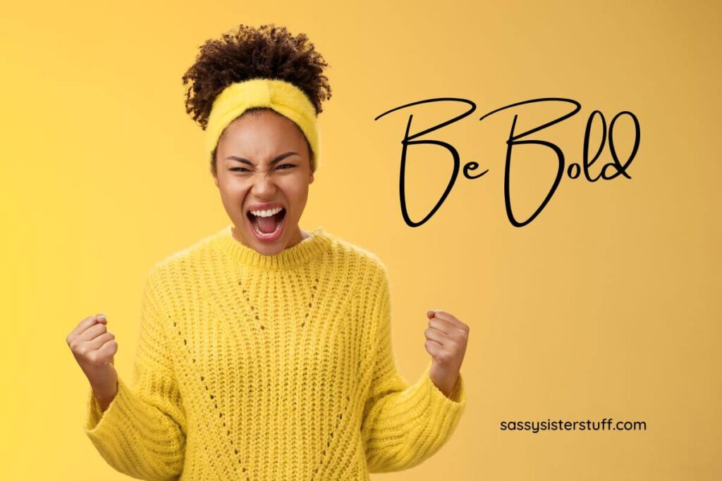 an excited young women squealing in delight after reading her self help books on confidence and assertiveness