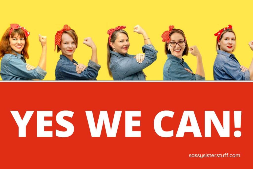 five women hold up an empowerment symbol with their fist and smile after reading self help books on confidence and assertiveness