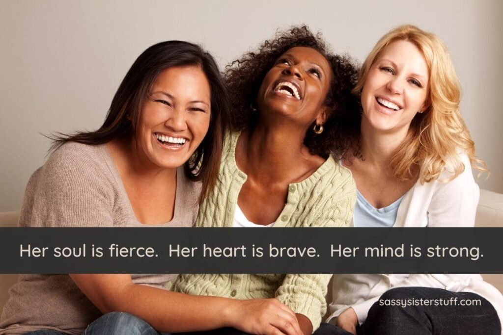 three women sit together and celebrate hard working woman quotes that inspire them