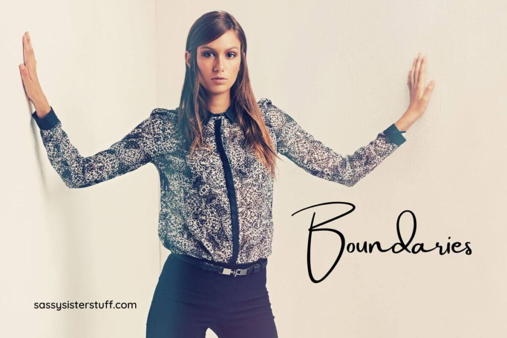 a strong competent young stands with her hands in a positive that shows boundaries