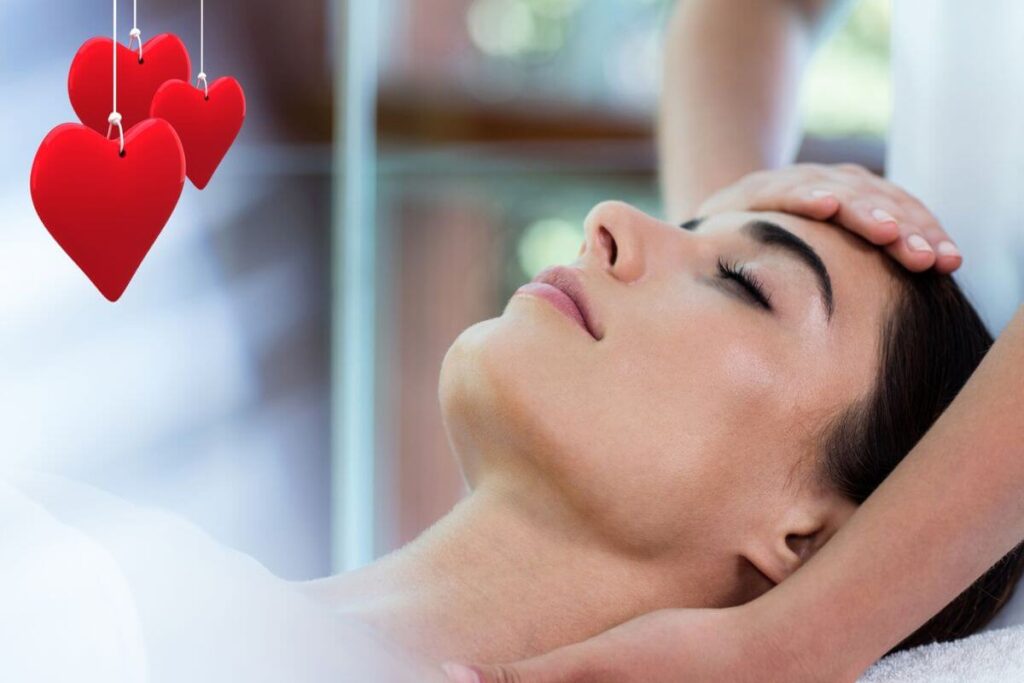 a close up of a woman getting a head and neck massage