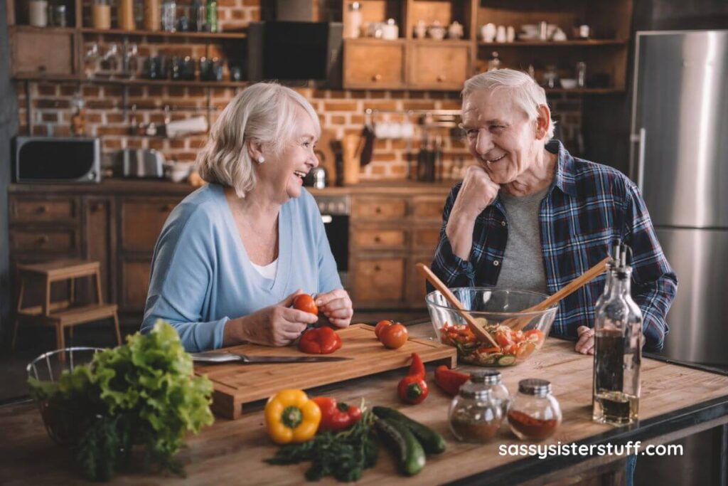 a happy elderly couple cooks together