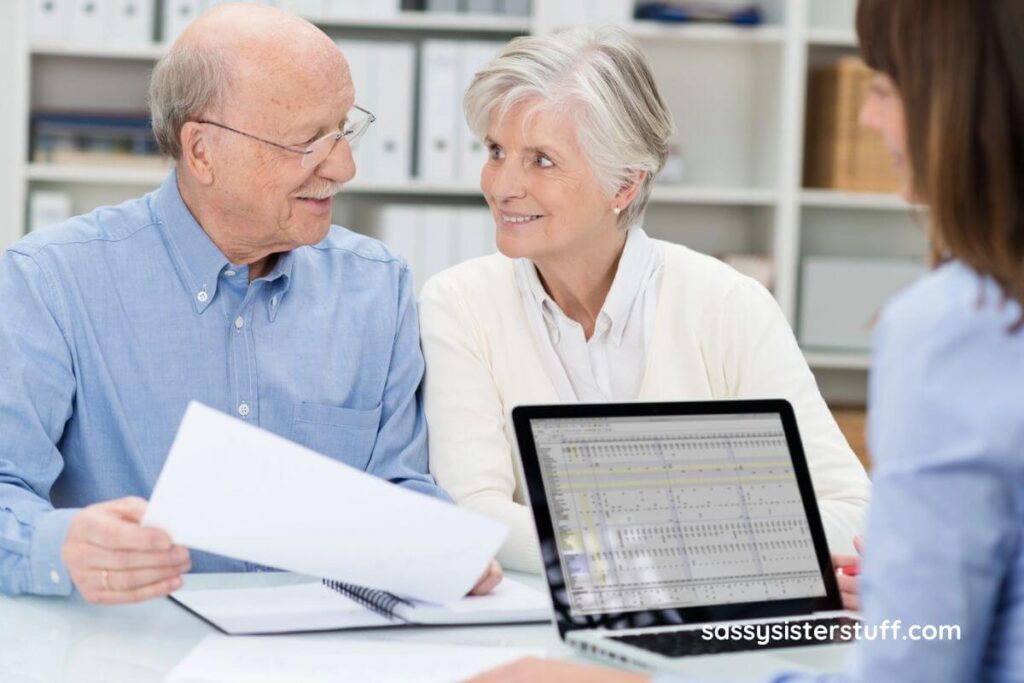 an elderly couple consults with a legal expert about blending their finances