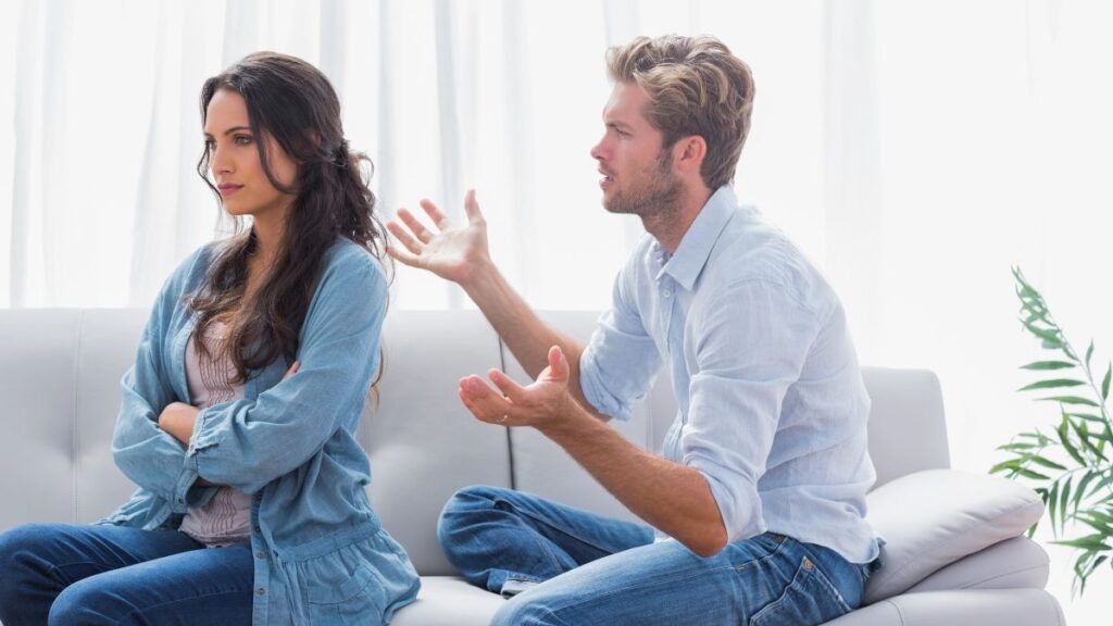 angry couple woman facing away from man