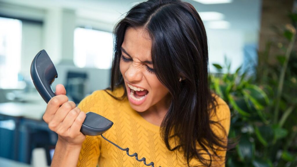 angry woman yelling at phone