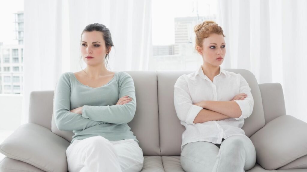 angry women sitting on couch