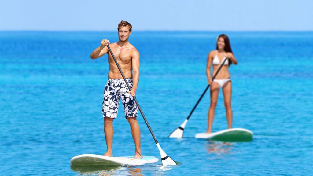 couple paddle boarding