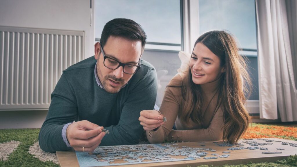 couple solving puzzle