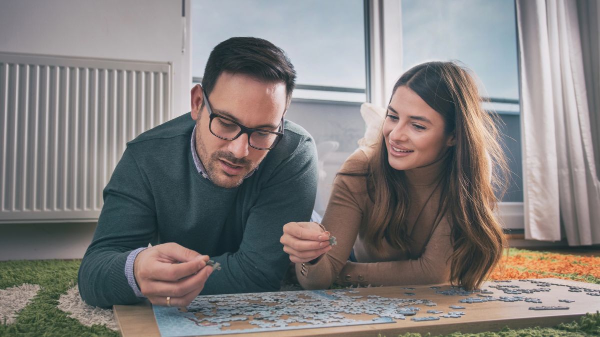 couple solving puzzle