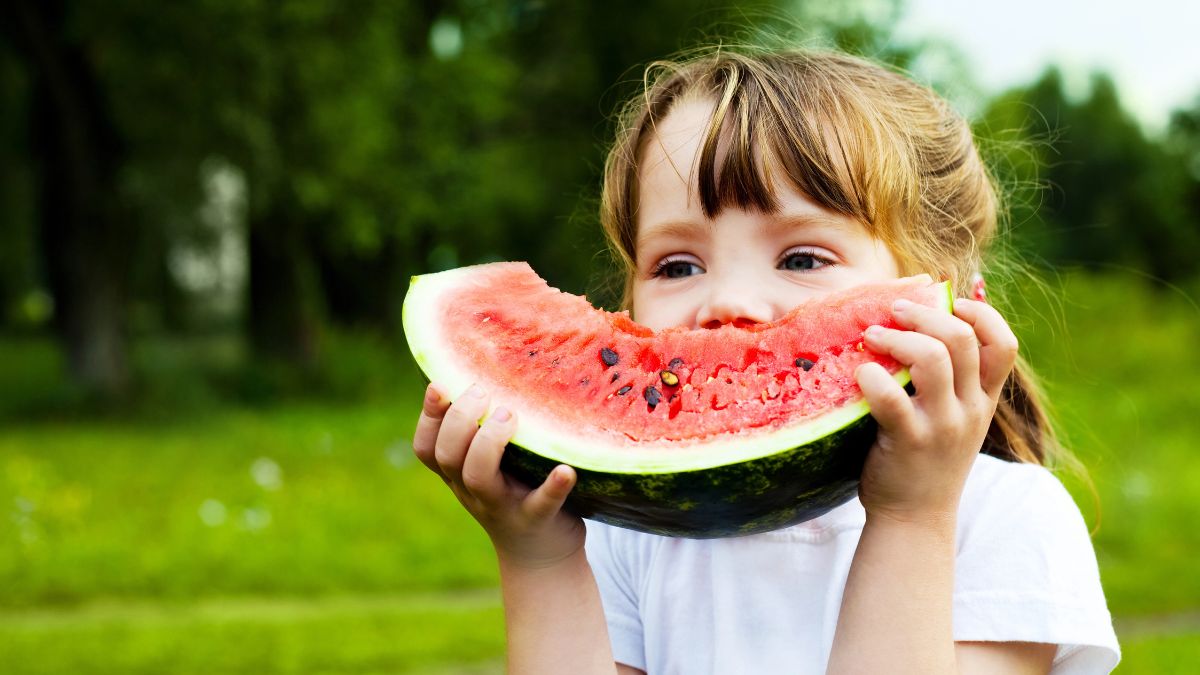 girl eating watermelon