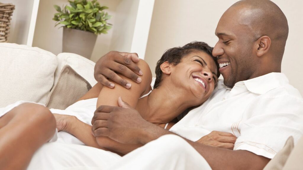 happy couple on couch