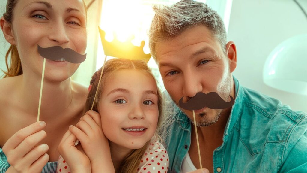 happy family with photo booth props