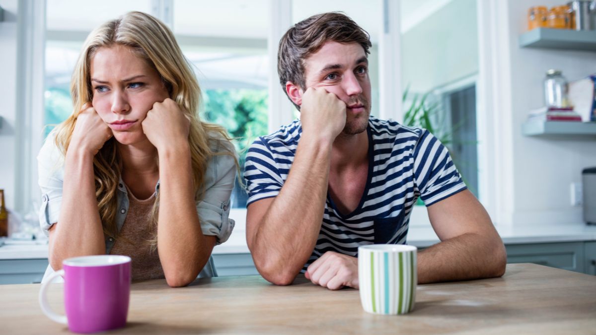 irritated couple looking away