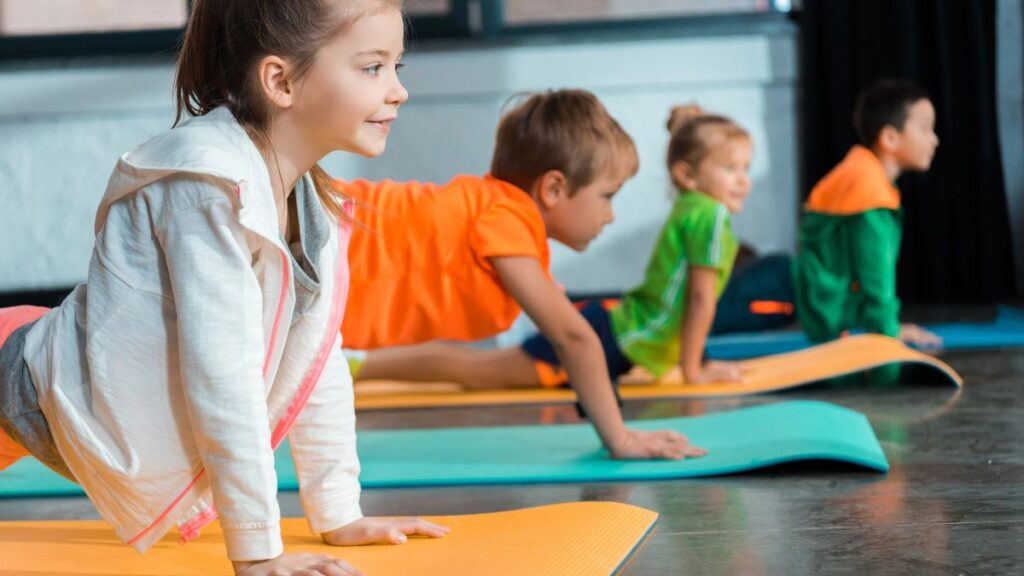 kids doing yoga AndrewLozovyi