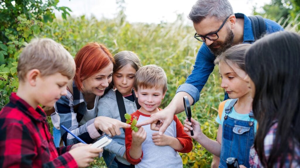 kids looking at plants