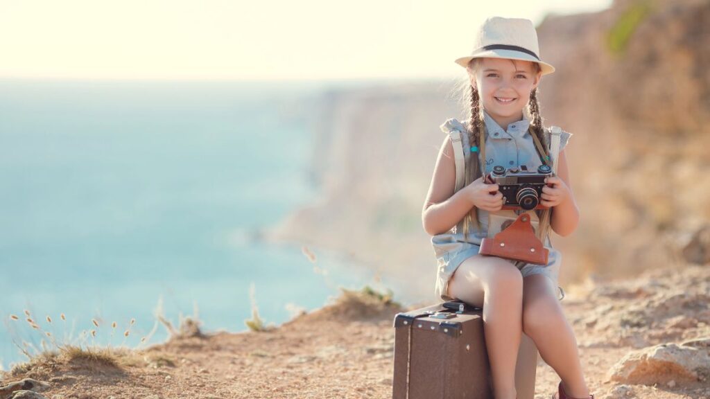 little girl with camera