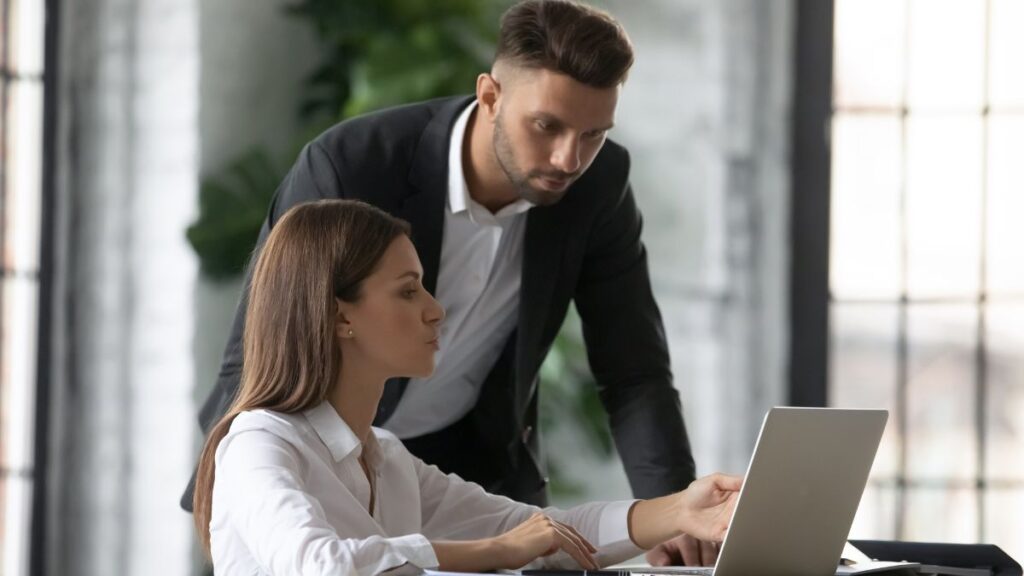 man and woman working together