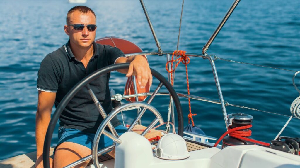 man driving boat