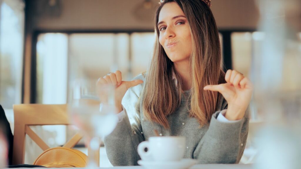 selfish woman pointing to self