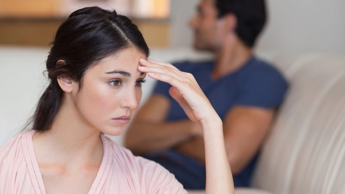 unhappy couple looking stressed