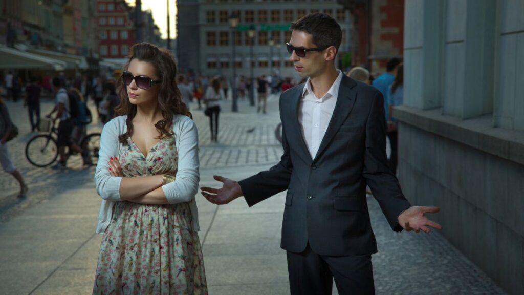 upset couple standing outside