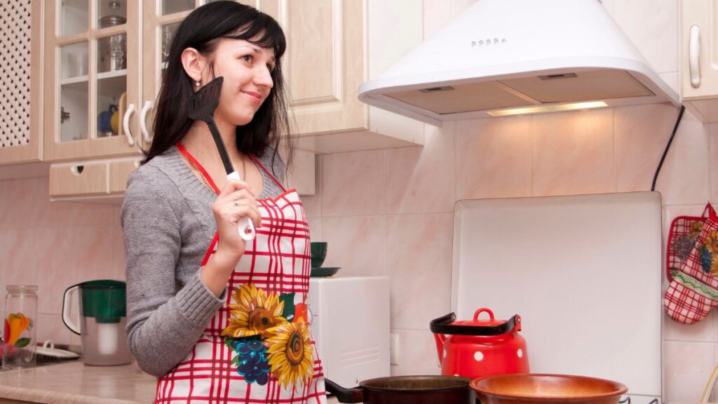 woman cooking in kitchen