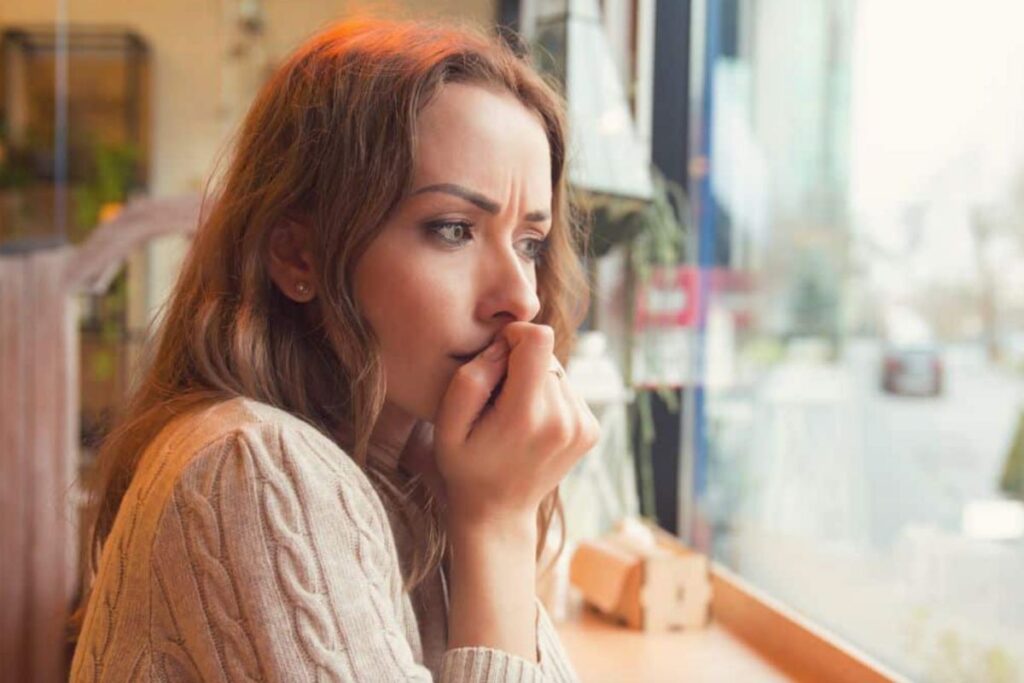 woman looking upset looking away