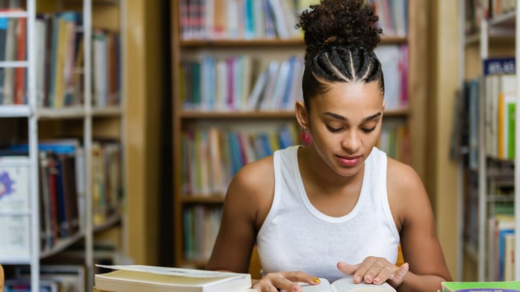 woman reading in library