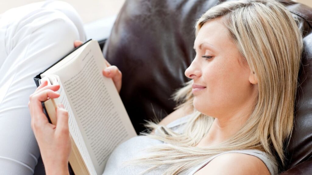 woman reading on chair