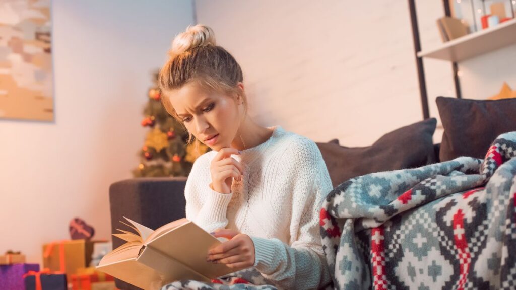 woman reading on floor