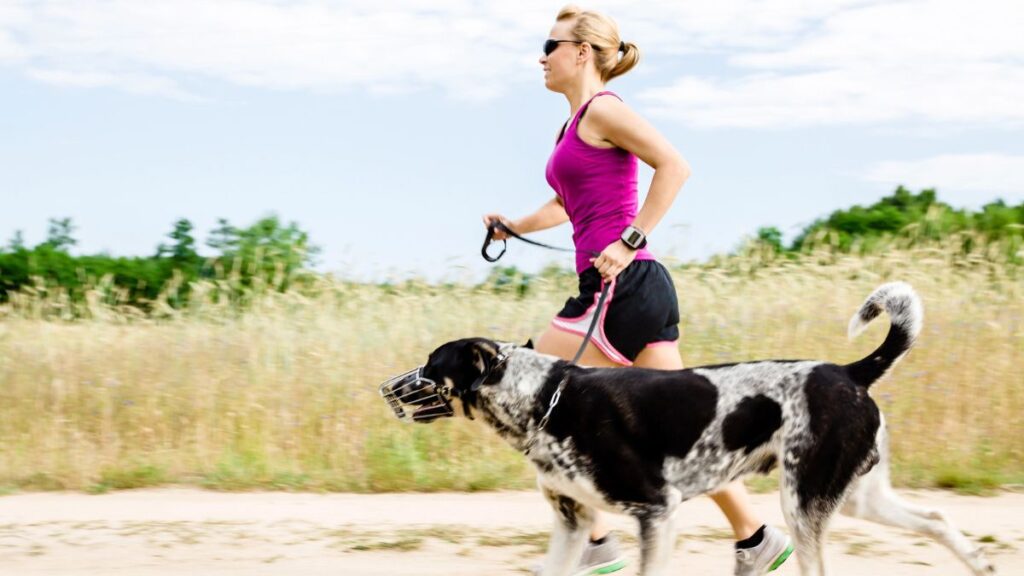 woman running with dog