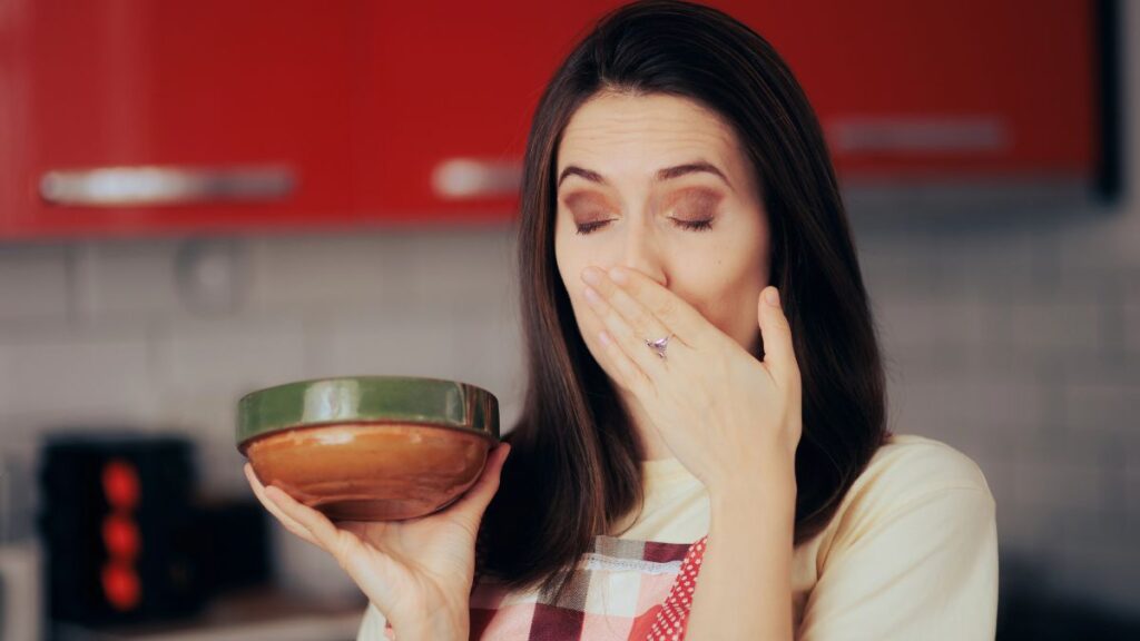 woman smelling something